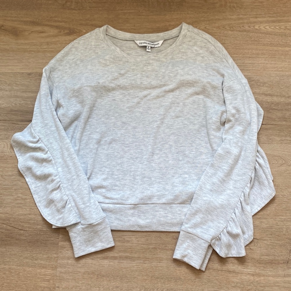 Cupcakes and Cashmere cropped sweater with ruffle detail.